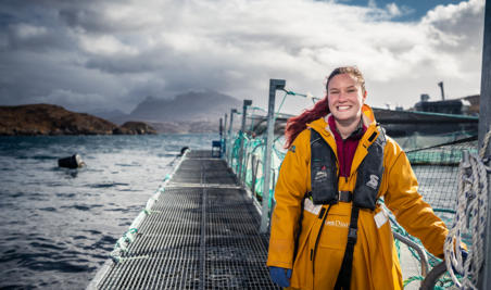 Loch Duart farm worker at a sea site